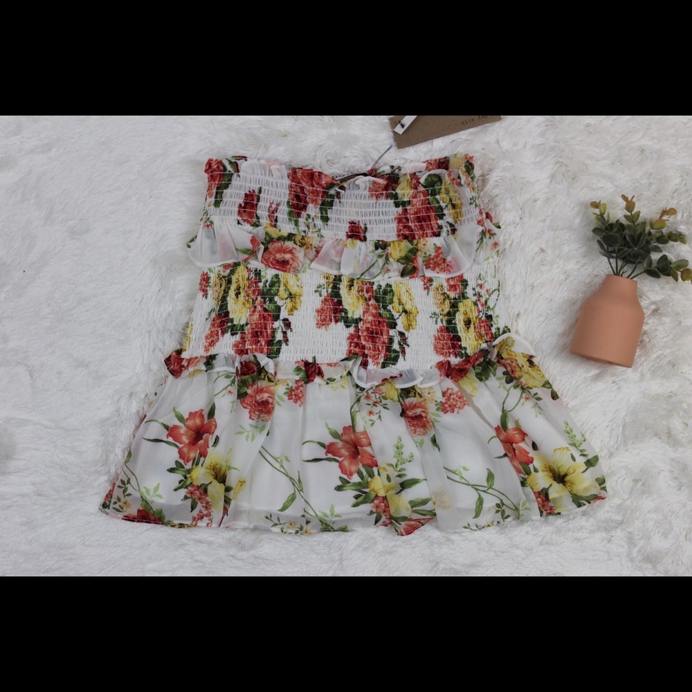DO+BE floral strapless blouse.